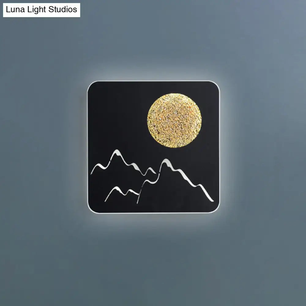 Black white grey Nordic wall light fixture with textured gold moon and white mountain silhouettes for bedroom use