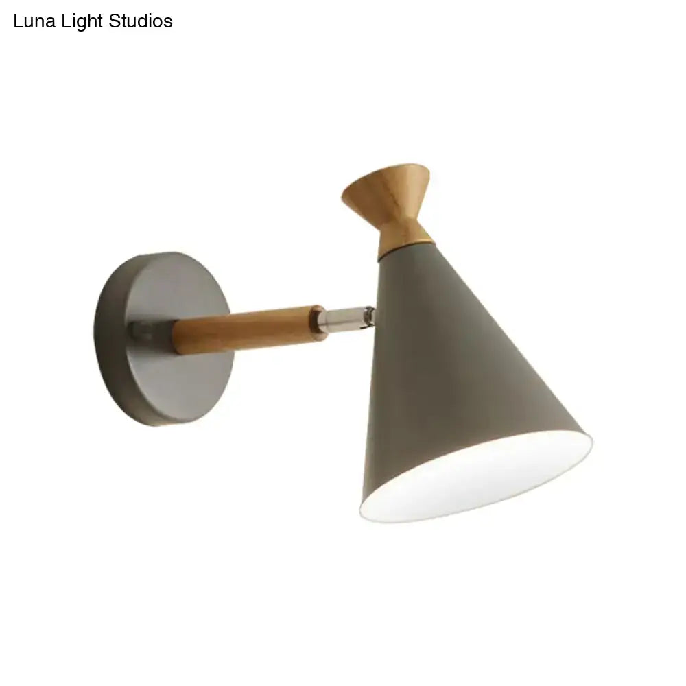 Modern nordic wall light with matte gray metal cone shade, wooden accents, and sleek metal mounting plate for reading