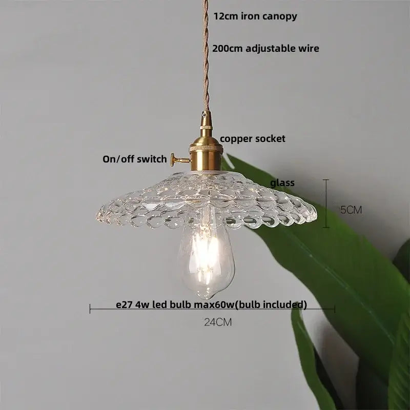 Nordic brass and clear glass led pendant light with textured scalloped canopy and brass finish for dining rooms decorbites clear glass