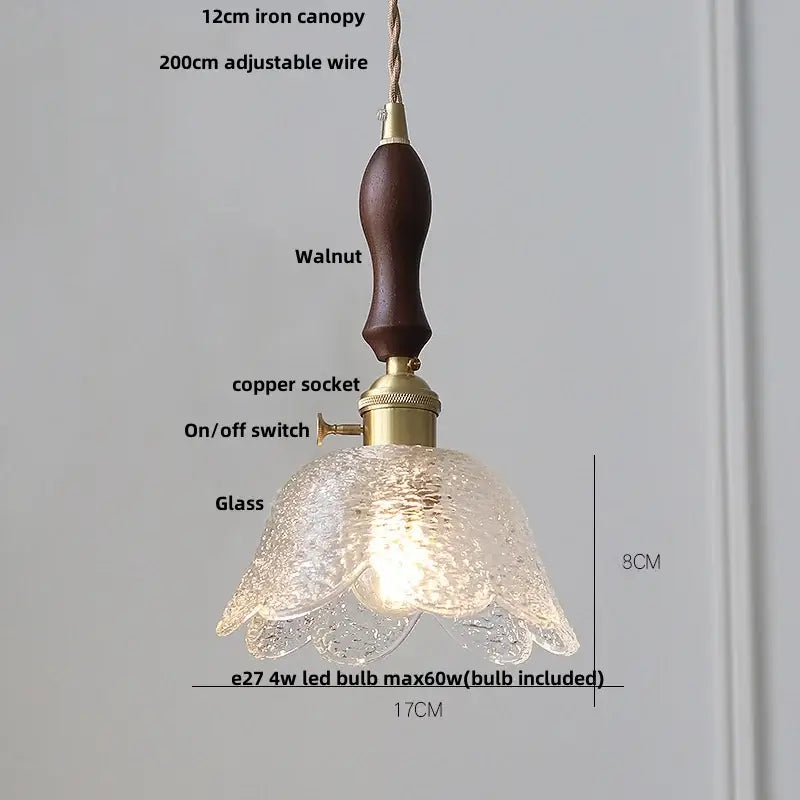 Nordic brass and clear glass led pendant light with textured glass, dark walnut handle, and brass accents for dining rooms