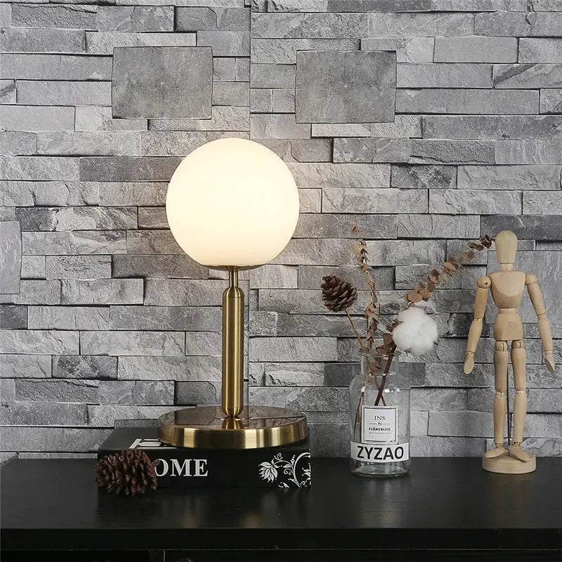 Gold-finished nordic brass and decorbites glass ball led table lamp with frosted glass globe shade for bedroom decor