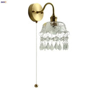 Nordic brass crystal glass led wall light with clear faceted shade and dangling crystal droplets for bedroom decorbites crystal glass
