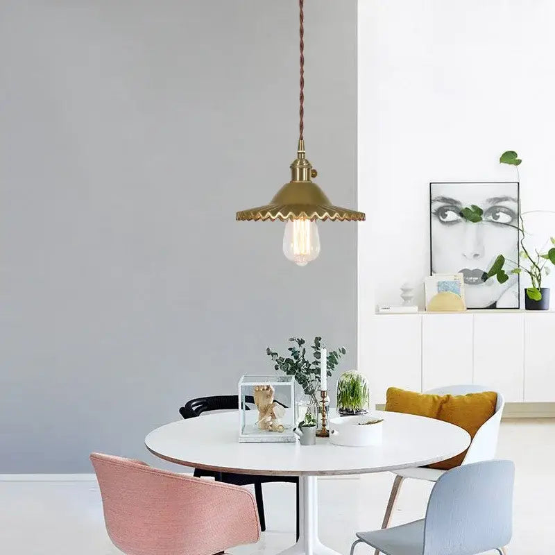 Brass pendant light with scalloped glass flounce led shade and exposed filament bulb for dining room lighting
