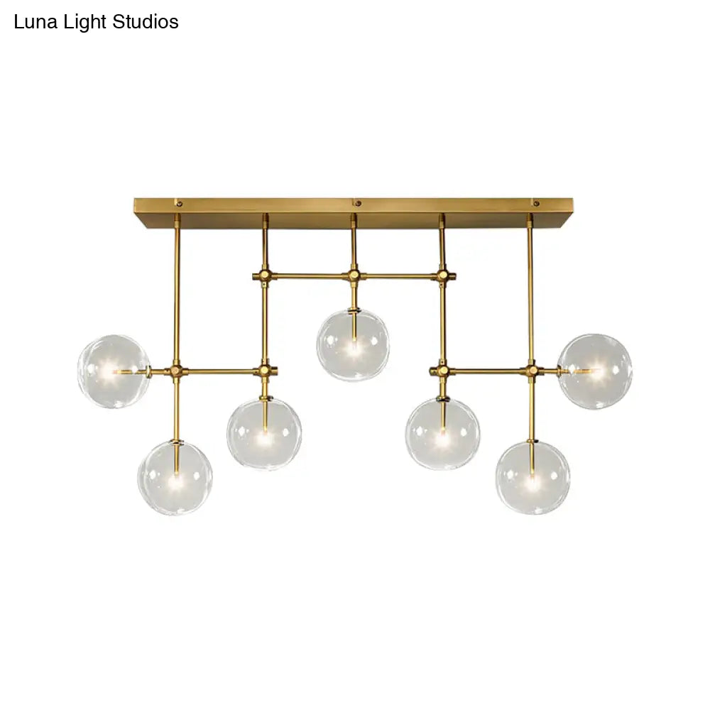 مصباح معلق على شكل جزيرة من DecorBites™ Nordic Clear Glass مكون من 7 لمبات باللونين الأسود والذهبي لغرفة المعيشة