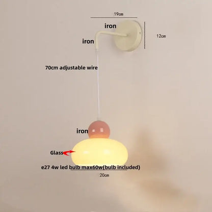 Cream-colored glass wall light with matte iron curved arm and adjustable 70cm wire by decorbites iron nordic