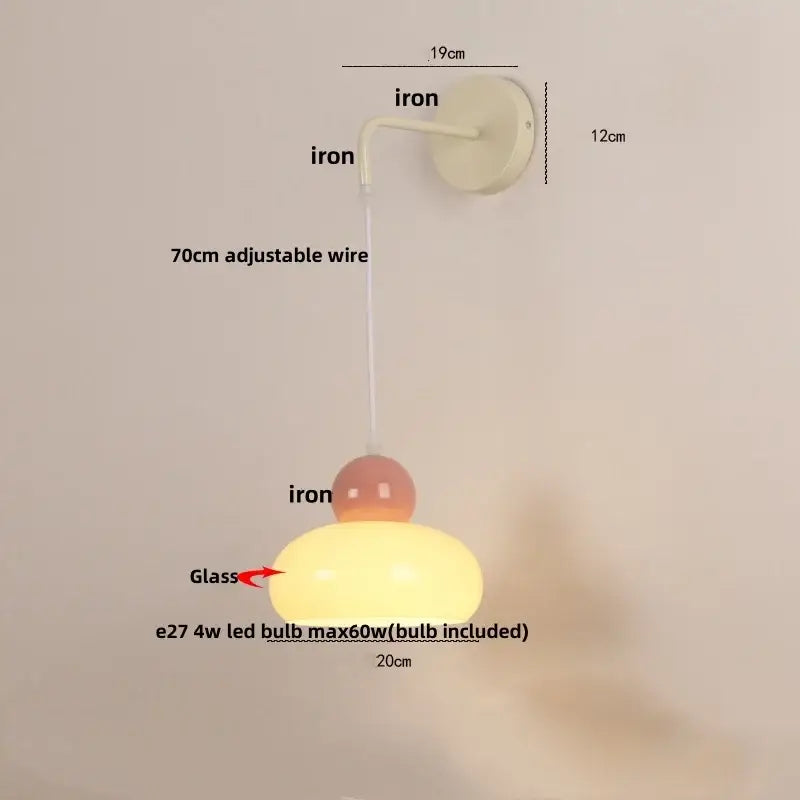 Cream-colored glass wall light with matte iron curved arm and adjustable 70cm wire by decorbites iron nordic