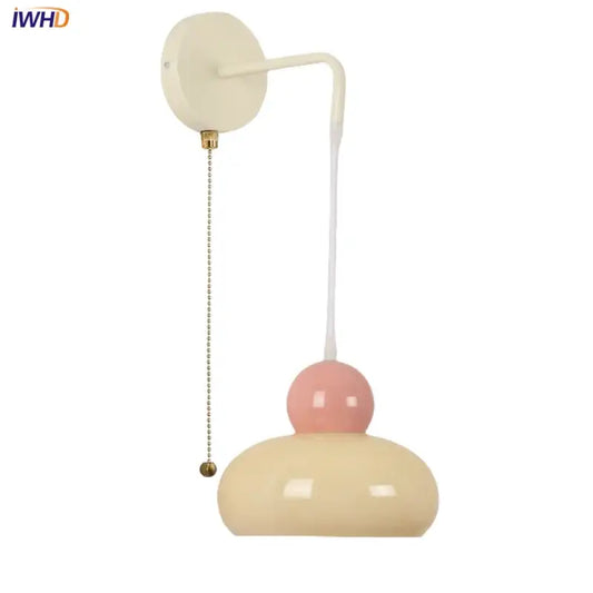 Nordic cream and blush pink glass two-tiered wall light fixture with curved white arm and brass pull chain by Decorbites Iron Nordic