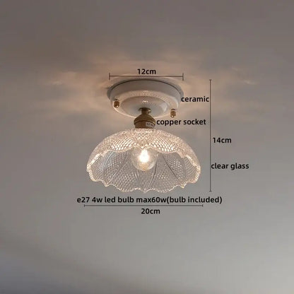 Nordic cream ceramic led ceiling light with clear glass lampshade and intricate cut patterns on copper socket base