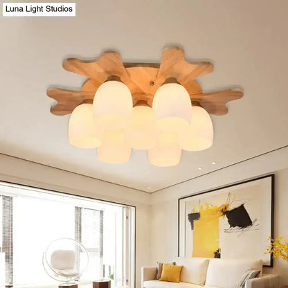 Nordic cream glass bell ceiling light with warm-toned cloud-shaped frosted shades and natural wood base for bedroom
