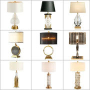 A collection of nine nordic crystal table lamps with brass accents and white black or beige lampshades for bedroom use