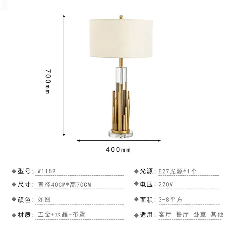 Elegant nordic crystal table lamp with gold-toned brass accents and off-white fabric shade for bedroom use