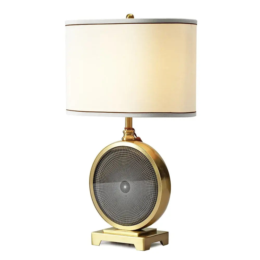 Nordic crystal table lamp with gold finish, mesh grille base, brass accents, and off-white cylindrical shade with dark trim
