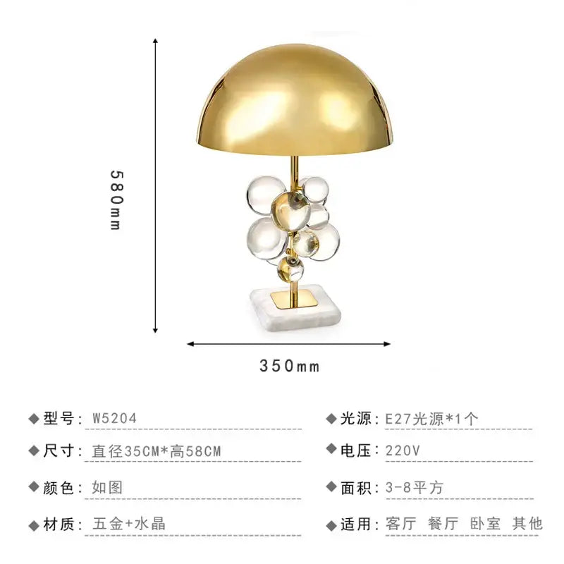 Nordic crystal table lamp with gold dome shape, clear crystal bubbles, brass accents, and white marble base for bedroom