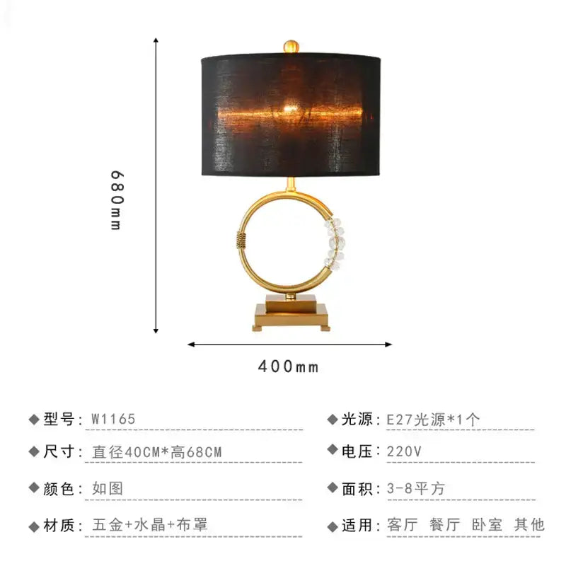 Gold-toned nordic crystal table lamp with brass accents, clear crystal base, and black fabric shade for bedroom use
