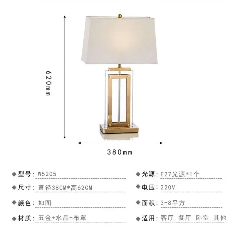 Gold-toned nordic crystal table lamp with rectangular crystal base and cream fabric shade for bedroom use