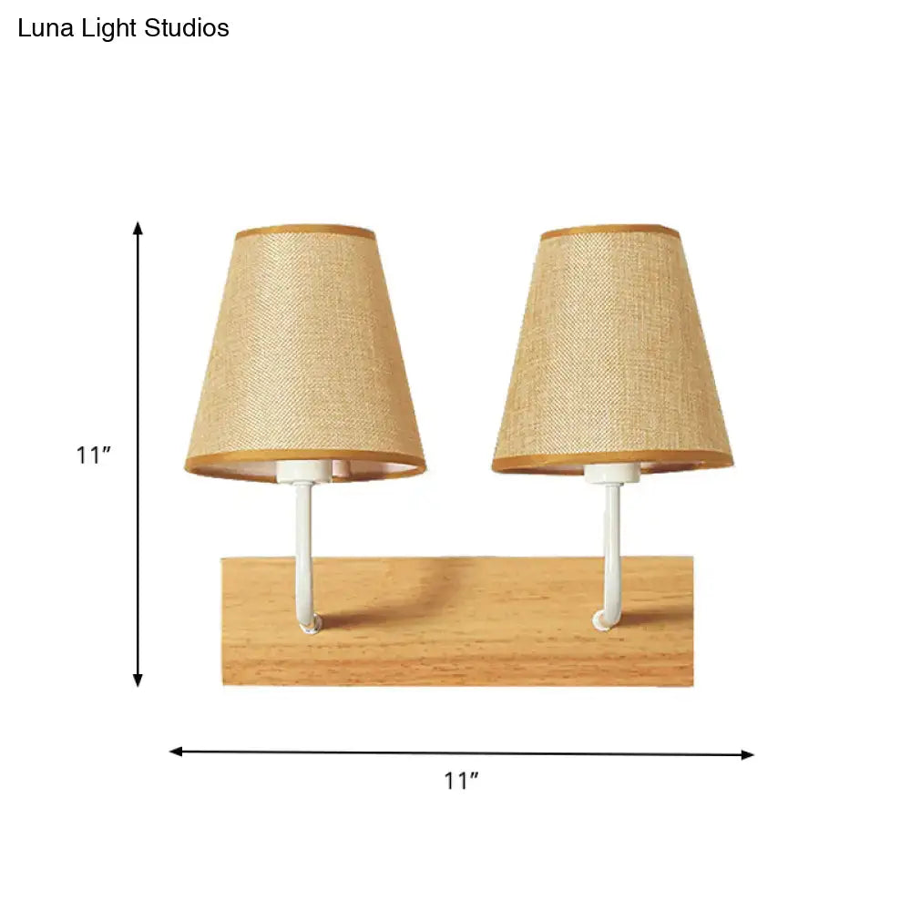Pair of beige woven flaxen and wood bedroom wall sconce led incandescent light mounted on a white wall fixture
