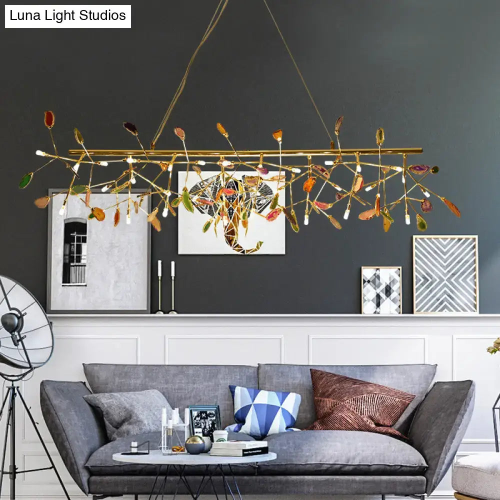 Nordic gold and colorful branch ceiling light featuring a gold-toned leaf-inspired chandelier for dining room use