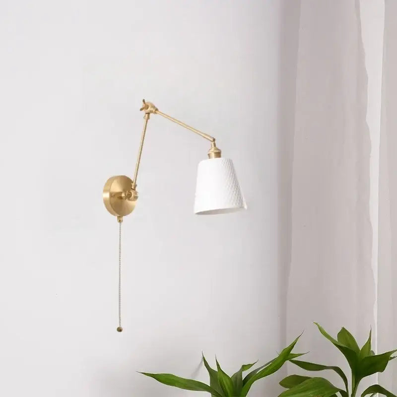 Gold-finished ceramic led wall lamp with ribbed glass shade and adjustable arm for bedroom decorbites ceramic led wall lighting