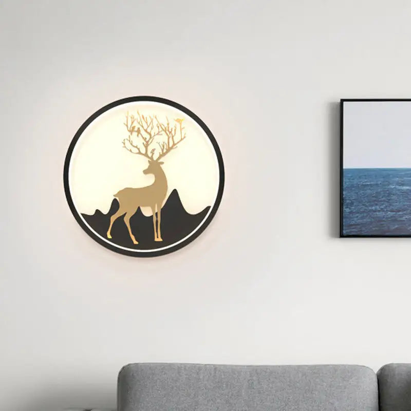 Nordic gold deer circle wall lamp with black frame and cream background featuring a gold deer wall-mounted fixture type