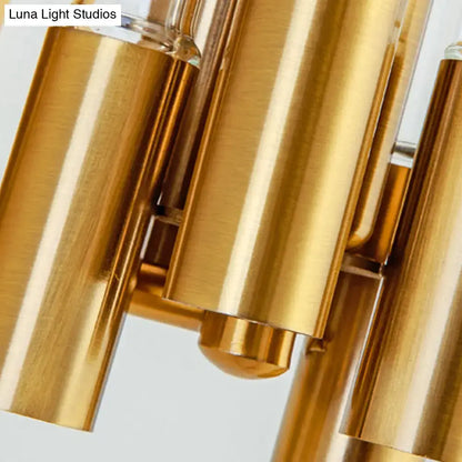 Nordic gold tube wall lamp with golden brass cylindrical elements and polished reflective surfaces for living room