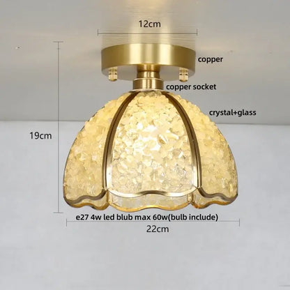 Gold-toned copper ceiling light with textured amber glass crystal shade for bedroom use in nordic green and purple mosaic style