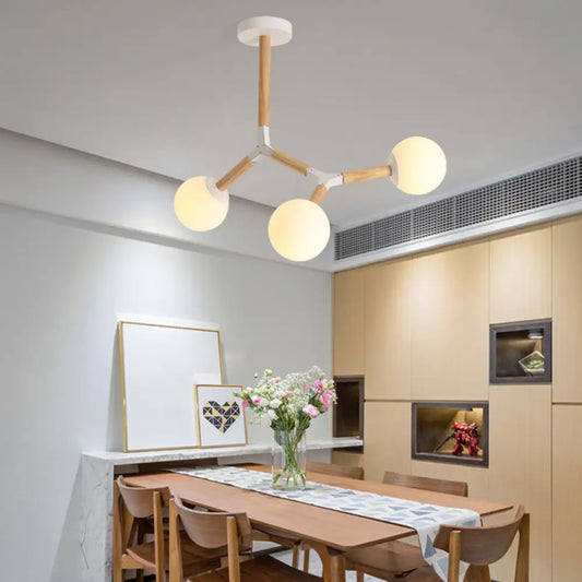 Lámpara de araña nórdica de cristal soplado a mano para comedor con detalles en madera