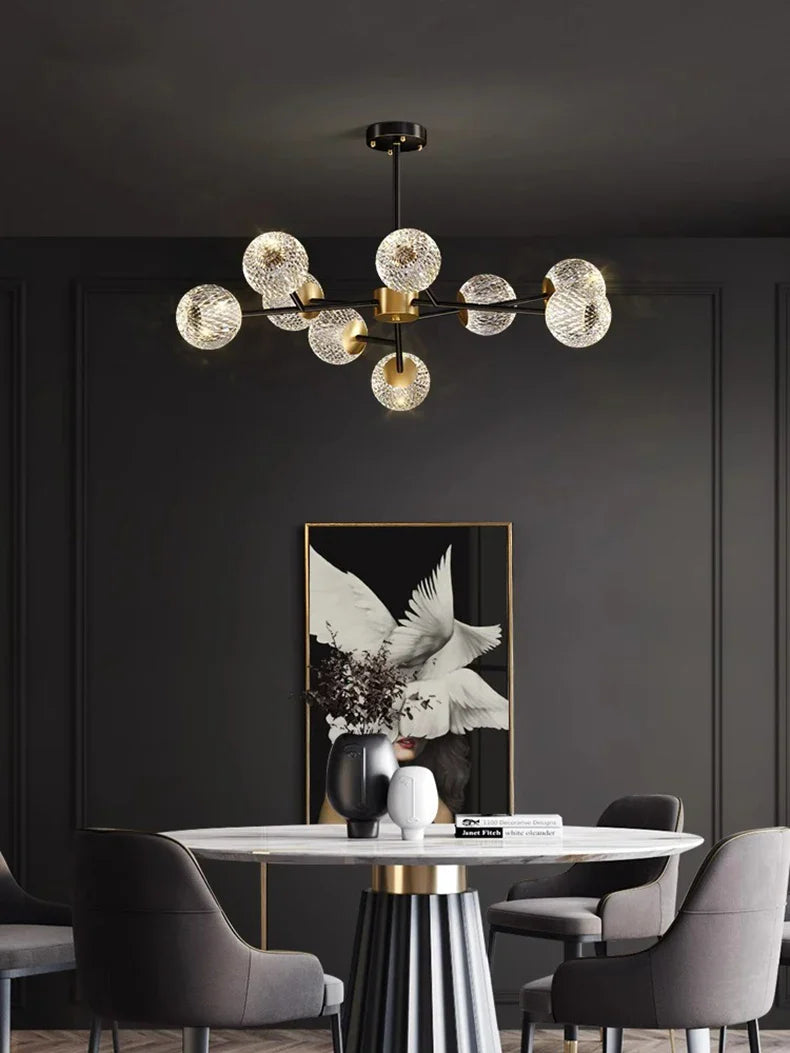 Modern chandelier pendant lamp with brass fixture and multiple glass globes for nordic dining room lighting