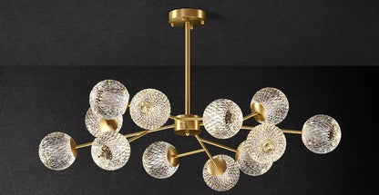 Gold-toned nordic pendant lamp with textured glass spheres for indoor dining room and living room lighting