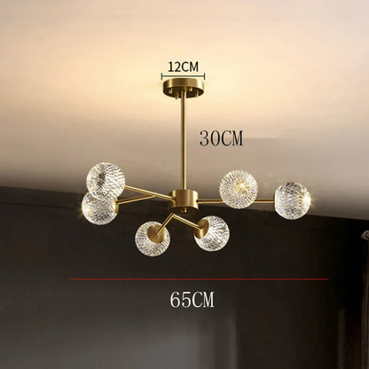 Gold-toned modern chandelier with six faceted crystal globe shades for nordic dining room pendant lighting