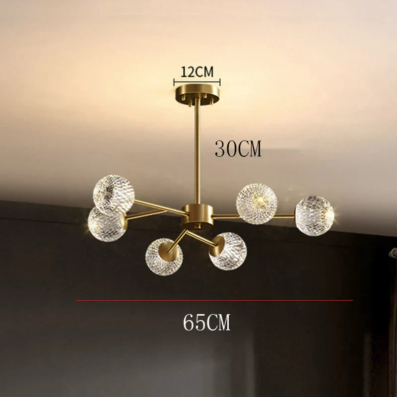 Gold-toned modern chandelier with six faceted crystal globe shades for nordic dining room pendant lighting
