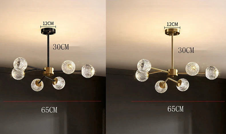 Modern chandelier with six clear faceted glass spheres hanging from a brass-finished arm for Nordic dining room lighting