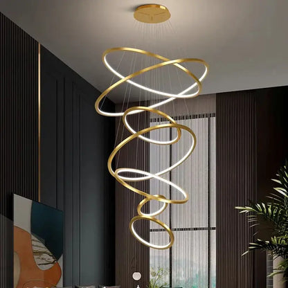 Gold-toned nordic home decorbites spiral ring chandelier with interlocking rings and led lighting for home decor stair use