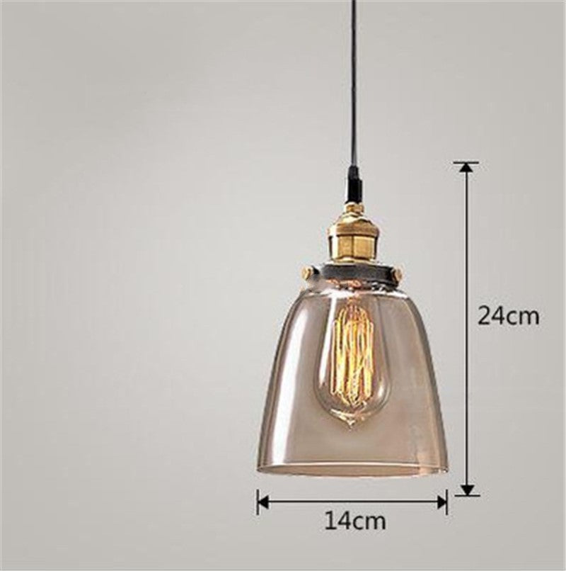 Vintage-inspired nordic industrial home bedroom glass chandelier with smoked glass pendant, brass accents, and exposed filament bulb
