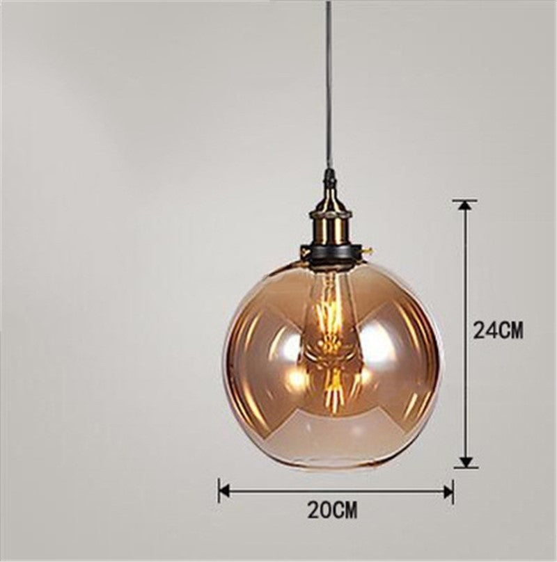 Amber glass globe pendant light with black metal accents and vintage edison bulb for nordic industrial glass chandelier