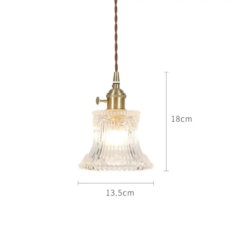Nordic japan style pendant lights with clear intricately cut glass shade and brass-finished metal fixture for dining room