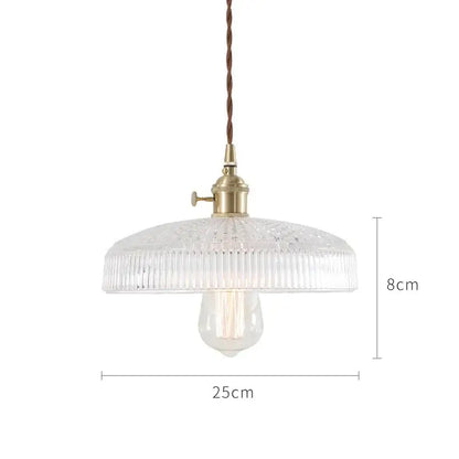 Clear glass pendant lights with vertical ridges and brass hardware featuring nordic japan style for dining room