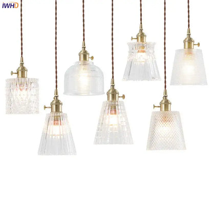 Nordic Japan style glass pendant lights with clear textured faceted shades and brass fixtures for dining room lighting