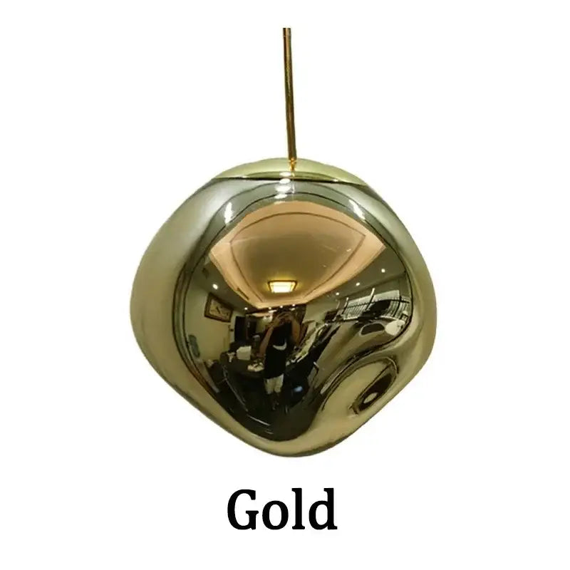 Gold-colored nordic lava glass chandelier with reflective spherical pendant and thin rod suspension for dining room decorbites nordic lava