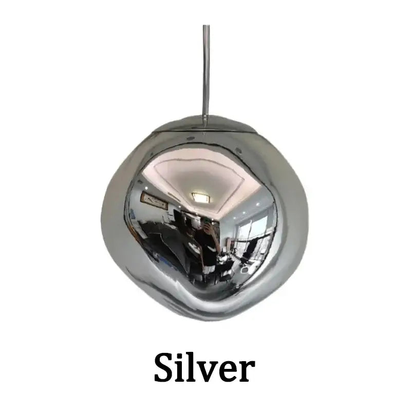 Silver spherical pendant light with polished metallic finish in nordic lava glass chandelier amber and gold dining room decorbites nordic lava