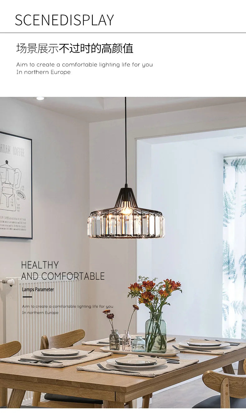 A modern black metal Nordic LED crystal pendant lamp with clear glass panels hanging above a wooden dining table
