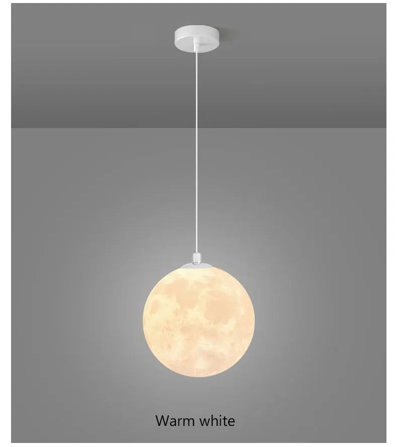 A warm white nordic led moon pendant light with a smooth surface for dining room kitchen and bar decor