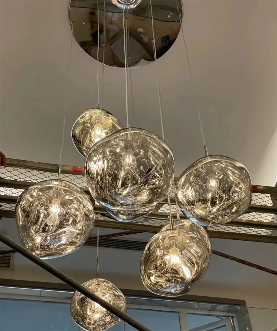Modern chrome-finished glass globe pendant lights with reflective swirling interior for nordic indoor lighting decor