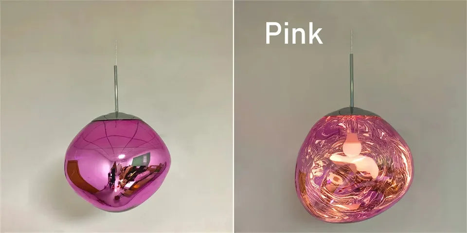 A glossy spherical nordic LED pendant light with vibrant pink metallic PVC finish for indoor home decoration