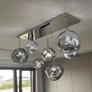 Modern chrome-finished glass globe nordic led pendant lights with rectangular ceiling mount for indoor living room lighting