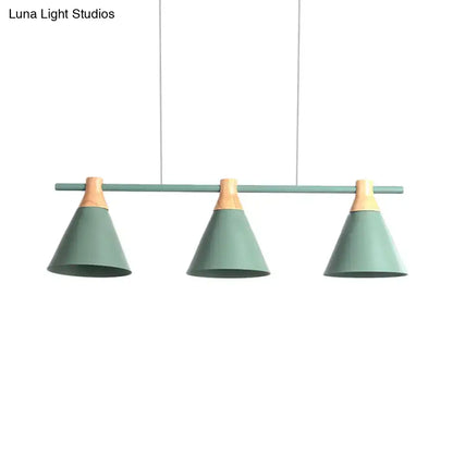 Modern mint green metal pendant light with wooden accents from DecorBites™ perfect for kitchen island lighting