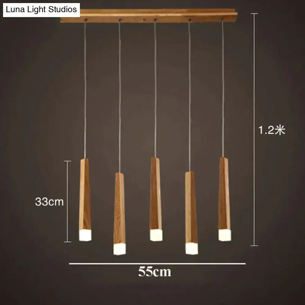 Nordic minimalist wood pendant lamp with five vertical tapered wood rods and white acrylic ends for dining room