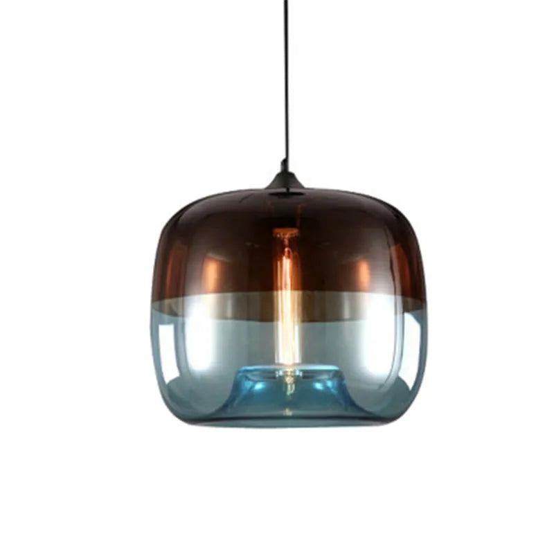 A nordic modern apple glass pendant light with amber and translucent blue rounded glass shade for living room decor