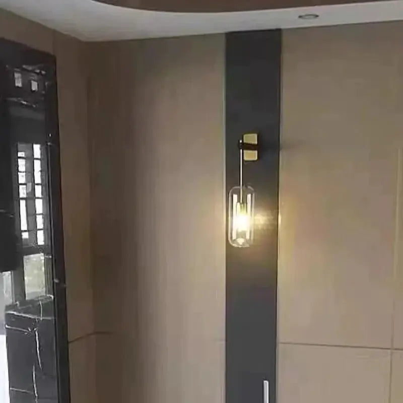 Nordic modern decor brass and glass wall lamp with a clear glass lampshade for bedroom modern decor glass lighting