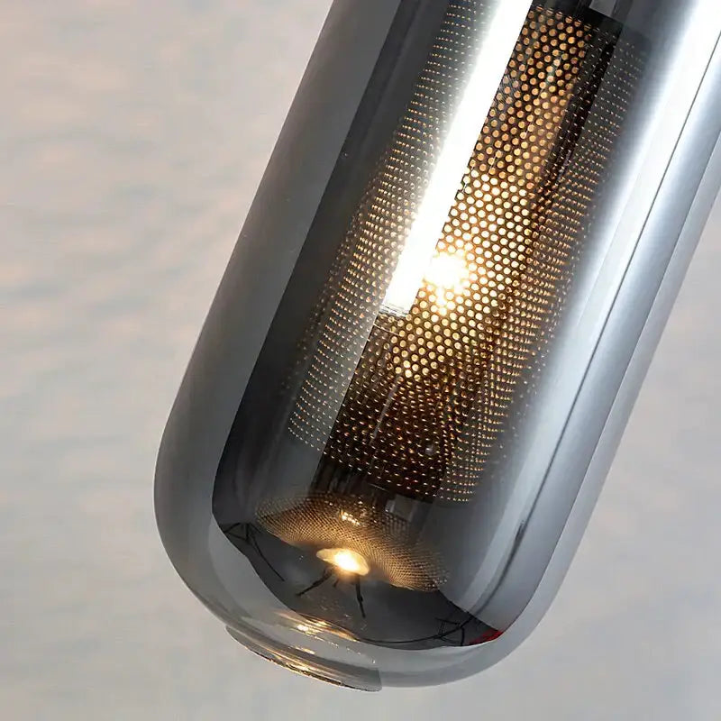 A nordic modern decor brass and glass lampshade pendant light with metallic silver finish and honeycomb mesh diffuser
