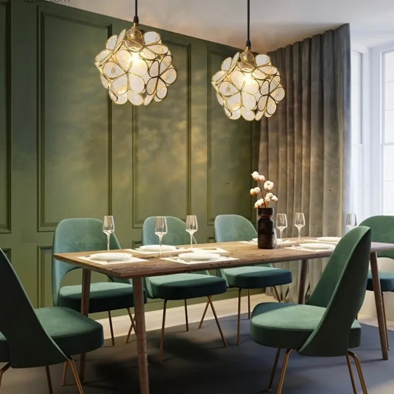 Gold-toned nordic modern petal acrylic pendant lamp with translucent white glass petals for bedroom and restaurant lighting